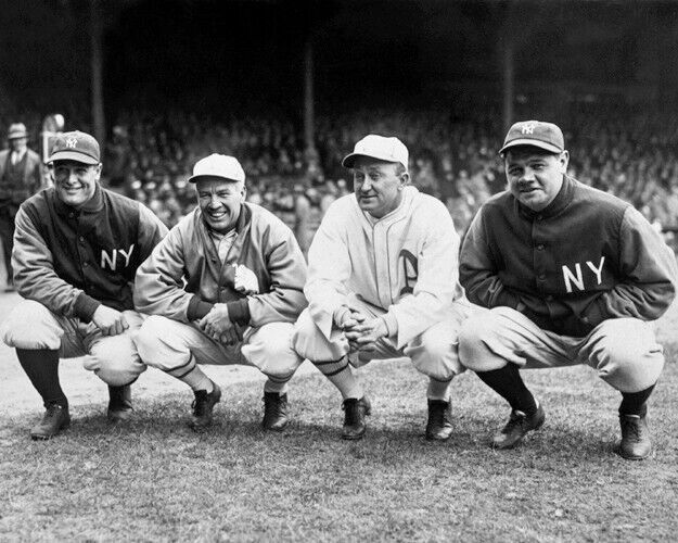 Yankees and Athletics legends Babe Ruth Lou Gehrig Tris Speaker Ty Cobb squatting together
