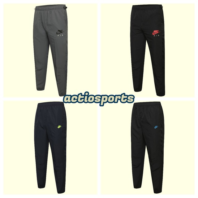 green nike tracksuit bottoms