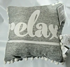 "relax" on Gray 12" by 12" Pillow with Pom Poms by Jay Franco & Sons, Inc.