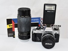 Vtg Nikon FG 35mm SRL Film Camera W/Nikon 50mm Series E Sigma Zoom II Lenes