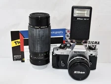 Vtg Nikon FG 35mm SRL Film Camera W/Nikon 50mm Series E & Sigma Zoom II Lenes