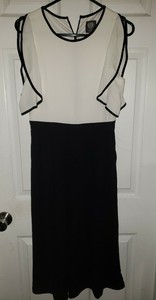 white top black bottom jumpsuit