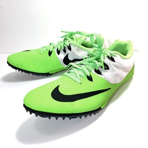 neon green track spikes