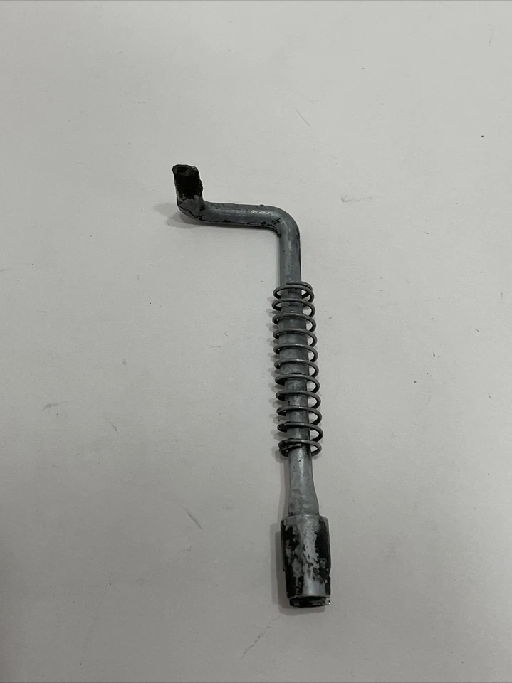 Barra de acelerador de motosierra con cremallera Homelite con resorte Foto 2 de 3