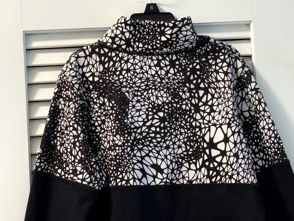 Chaqueta ligera Reebok para niñas talla XL 16 Foto 3 de 4