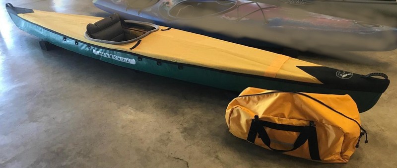 Used Pakboats Puffin Swift kayak and Werner Camano 220cm carbon fiber paddle.