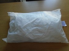 A Brand New White Pillow - Never Been Used Before.