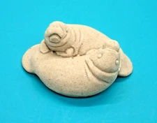 Kevin Rowley Sand Art Sculpture Manatee Pair Floaty Potatoes Florida Sea Cows
