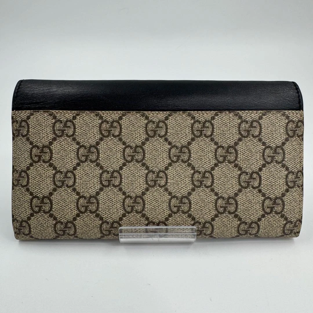 Portefeuille long homme Gucci noir GG Supreme cuir fin durable occasion