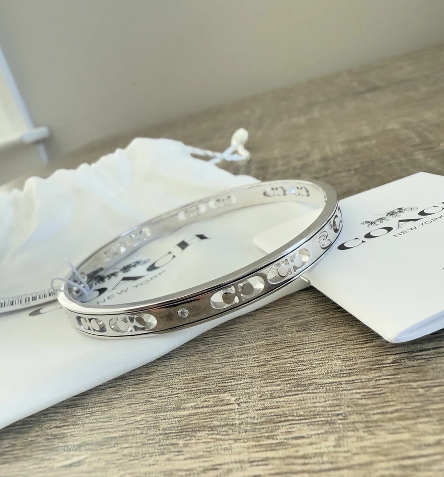Brazalete Coach 1707 Signature cristal tono plata nuevo con etiquetas Foto 4 de 4