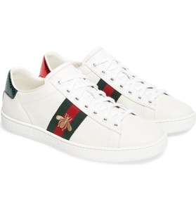 white sneakers with green and red stripe
