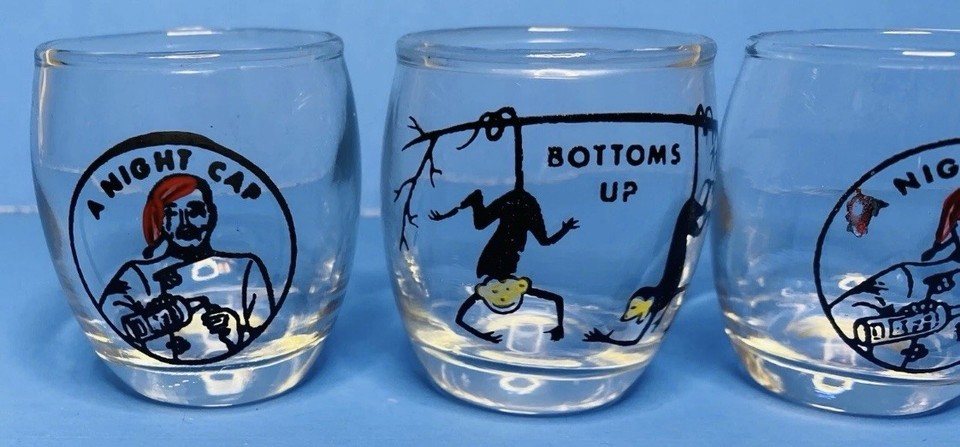 A set of four kitschy vintage nightcap-themed shot glasses that are pure retro party charm.