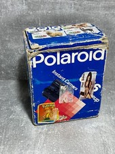 Polaroid 636 CloseUp, shoots 600 instant films - with built-in flash