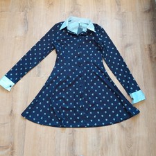 black floral print button up dress with collar and long sleeves floral...
