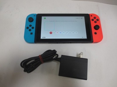 Nintendo Switch Console HAC-001(-01) w/ Neon Red and Blue Joycons
