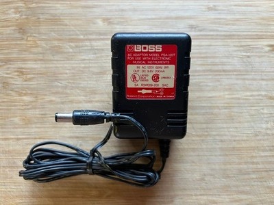 Original Boss PSA-120T Power Adapter. OUTPUT: 9.6V 200mA, INPUT: 120V 60Hz 9W *