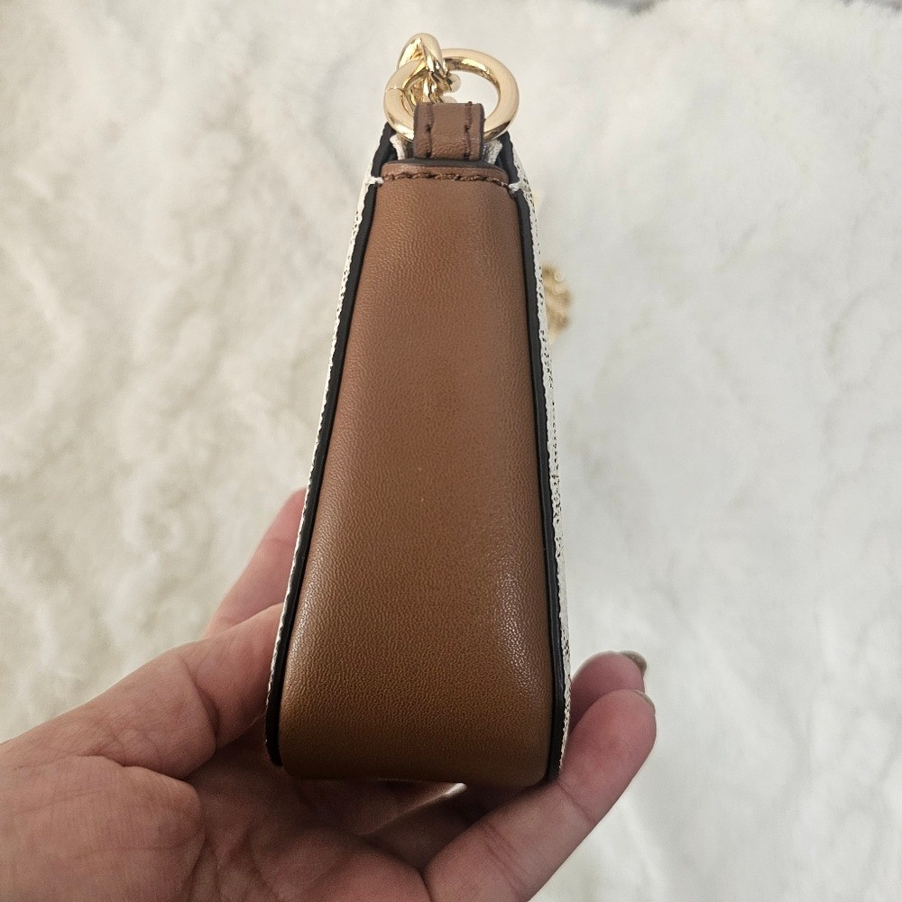 This is a Michael Kors Jet Set Small Chain Pouchette in vanilla/lugg color. thumbnail 5