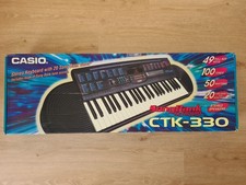 Casio CTK-330 Songbank Keyboard 49 Keys 100 Tones 550 Rhythms Portable Piano