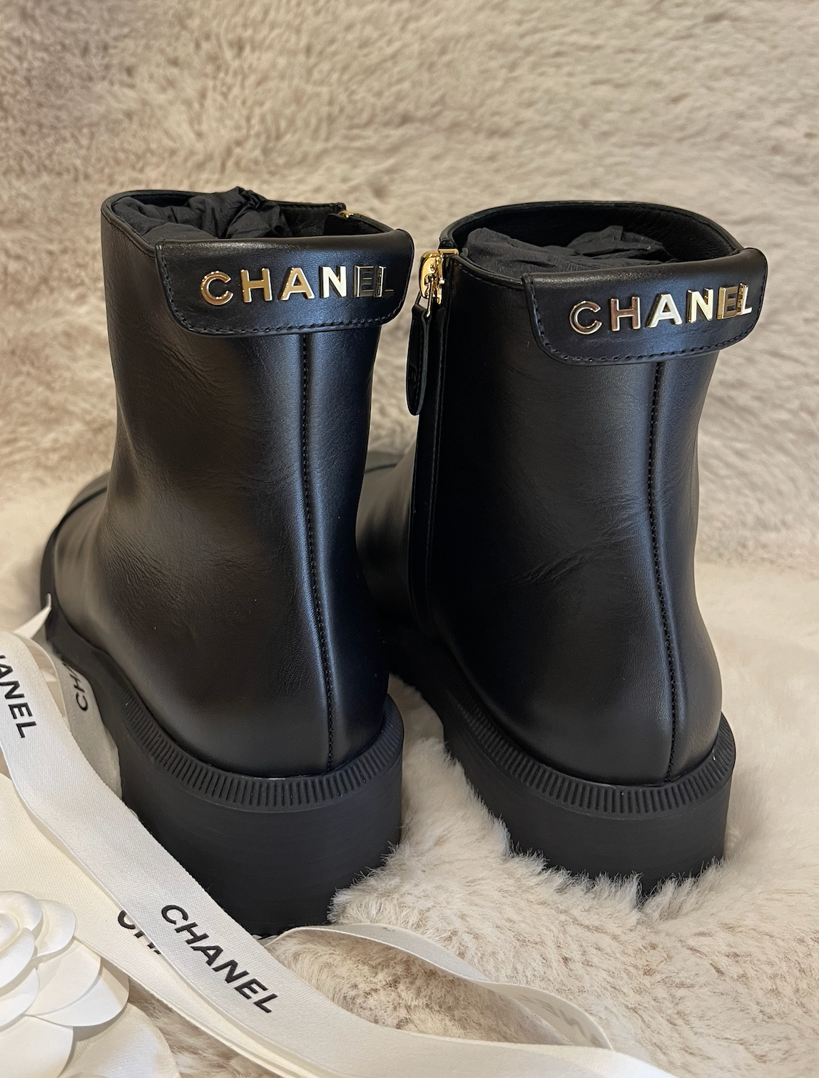 BNIB Authentic Chanel plain black leather short boots EU 38 US 7.5 Back logo