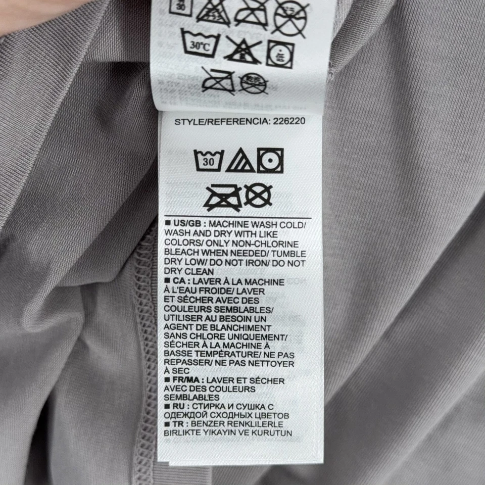 Camiseta sin mangas GAP para mujer gris espalda deportiva detalle de malla atletismo entrenamiento talla mediana Foto 4 de 4