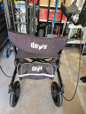 Days 4-Wheel Rollator Walker with Seat, Handbrakes  Storage Bag, Black