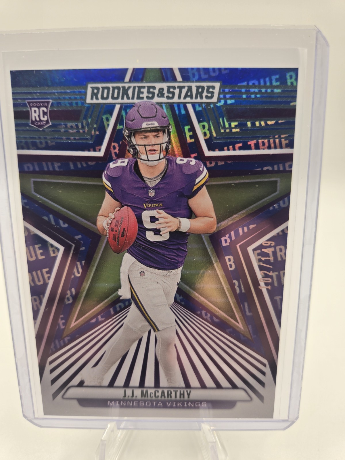 2024 Panini Rookies & Stars - Rookies J.J. McCarthy #135 True Blue /149 (RC)