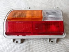 Original Hella Rücklicht Rückleuchte Audi 80 B1 Links + Lampenträger Neu