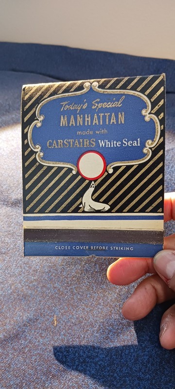  MANHATTAN MADE WITH CARSTAIRS WHITE SEAL...  1960S...UNSTRUCK MATCHBOOK