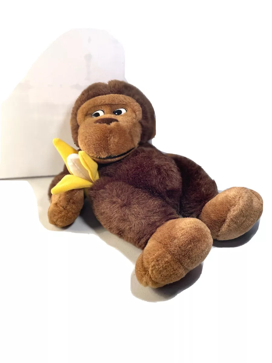 Vintage stuffed monkey with banana deals