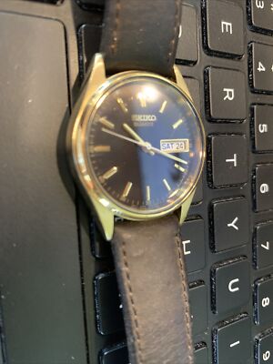 Seiko quartz vintage black dial gold tone case 34mm 7N43-8128 | eBay