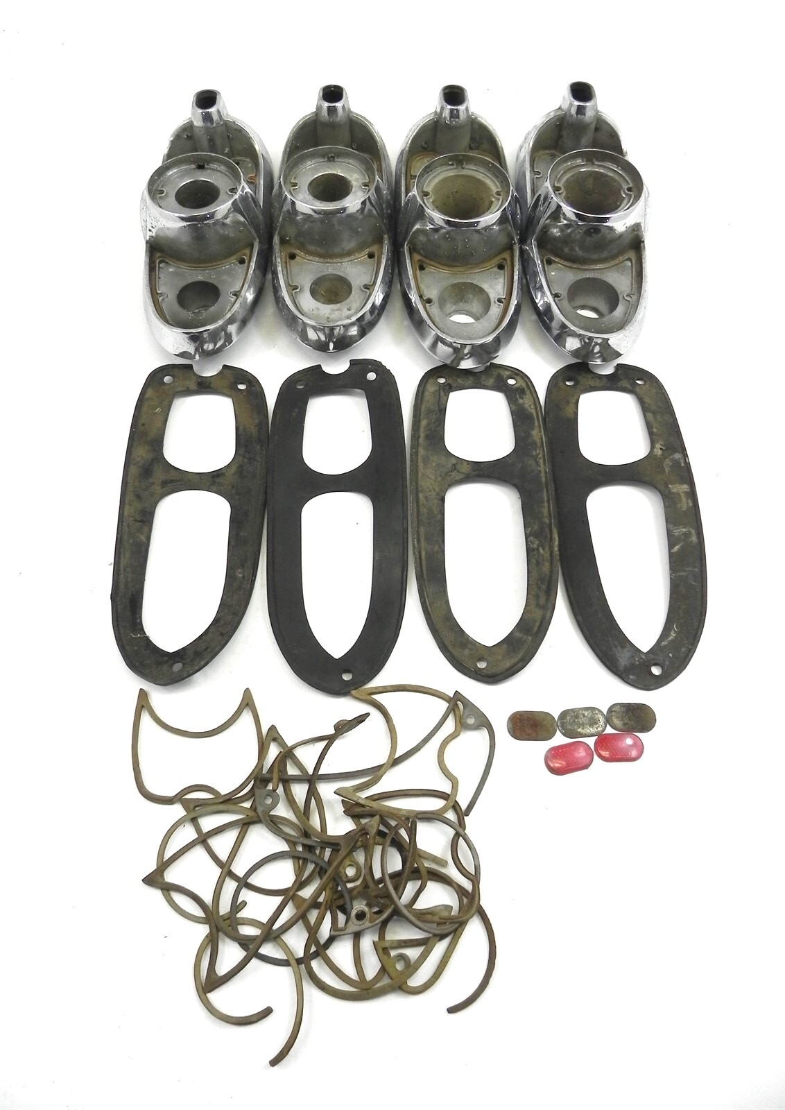 VINTAGE USED 1954 CHRYSLER TAIL LIGHT HOUSING AND PARTS LOT WITH WEAR & PITTING