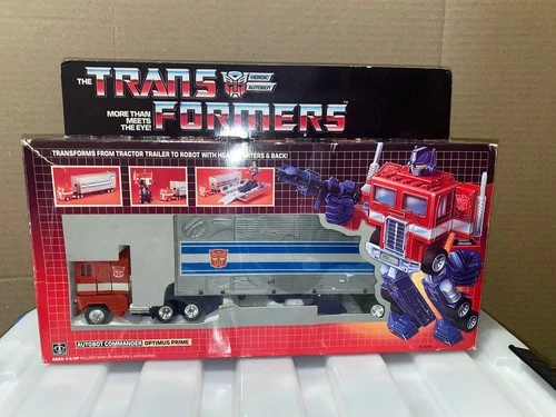 Transformers G1 Optimus Prime bloated metal plates original vintage box set read