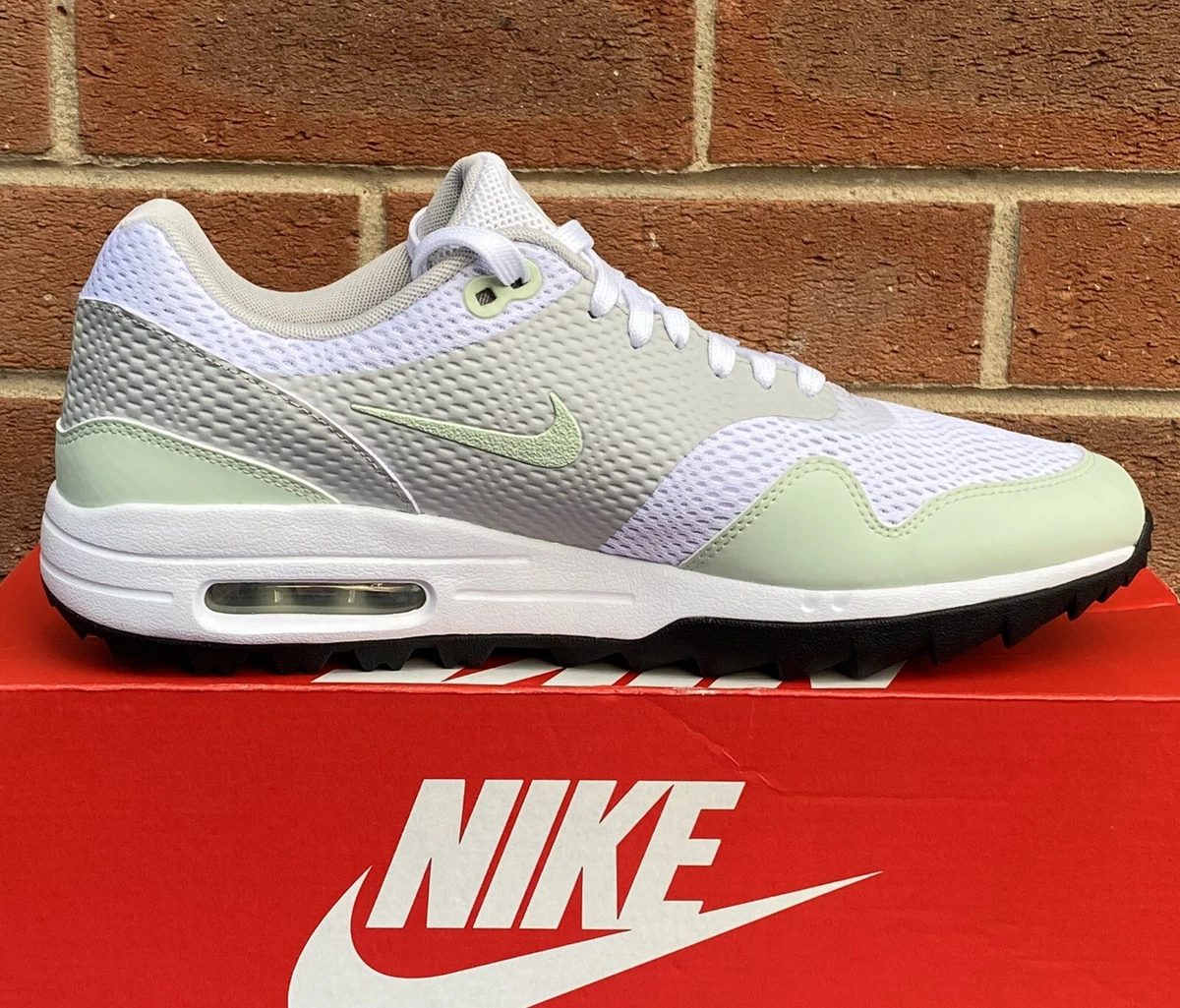 Nike green store mesh trainers