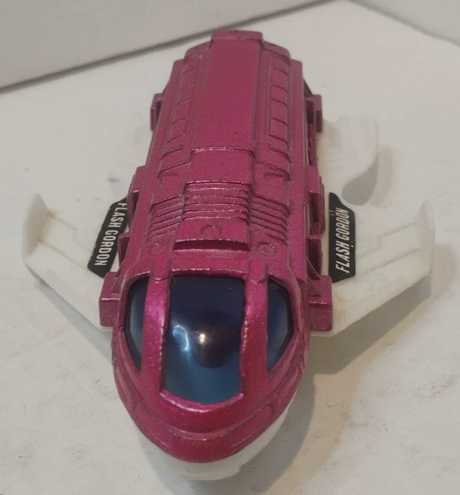 Nave espacial de juguete Flash Gordon Tootsie 1978 vintage modelo 10395 rosa intenso Foto 2 de 4