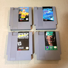 NES GAMES LOT (4) Wrestlemania, NARC, Tecmo Bowl, Silent Service