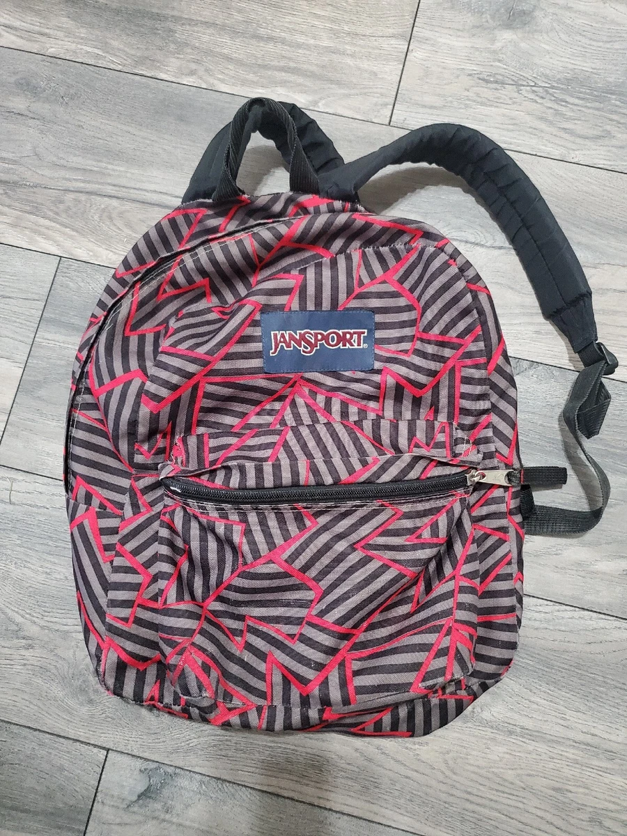 Black and top red jansport backpack
