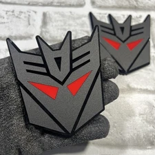 Fender Badges 2x Decepticon Transformer Mask  Red Eye Emblem Black Badge Decal