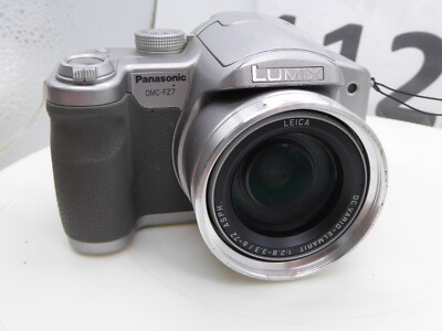 Panasonic Lumix DMC-FZ7 Digital Bridge Camera silver strap UK
