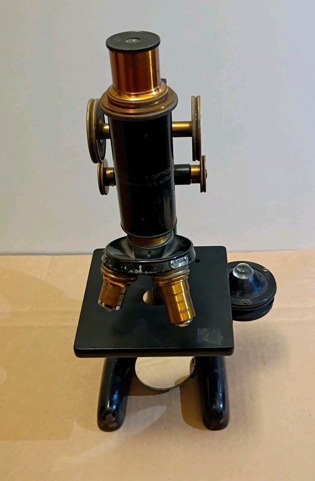 A genuine 1915 Bausch & Lomb microscope — an iconic piece of scientific history that's as gorgeous as it is functional as a display piece.