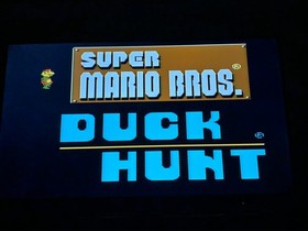 NES-001 Console With 2 Controllers, 1 Game, Zapper, Power Supply, and RF Switch