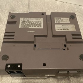 Juego de acci&oacute;n Nintendo NES consola dom&eacute;stica en caja probado con espuma de poliestireno y mandos