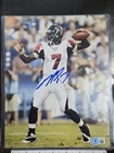 MICHAEL VICK SIGNED AUTOGRAPHED ATLANTA FALCONS 8x10 PHOTO BECKETT BAS COA