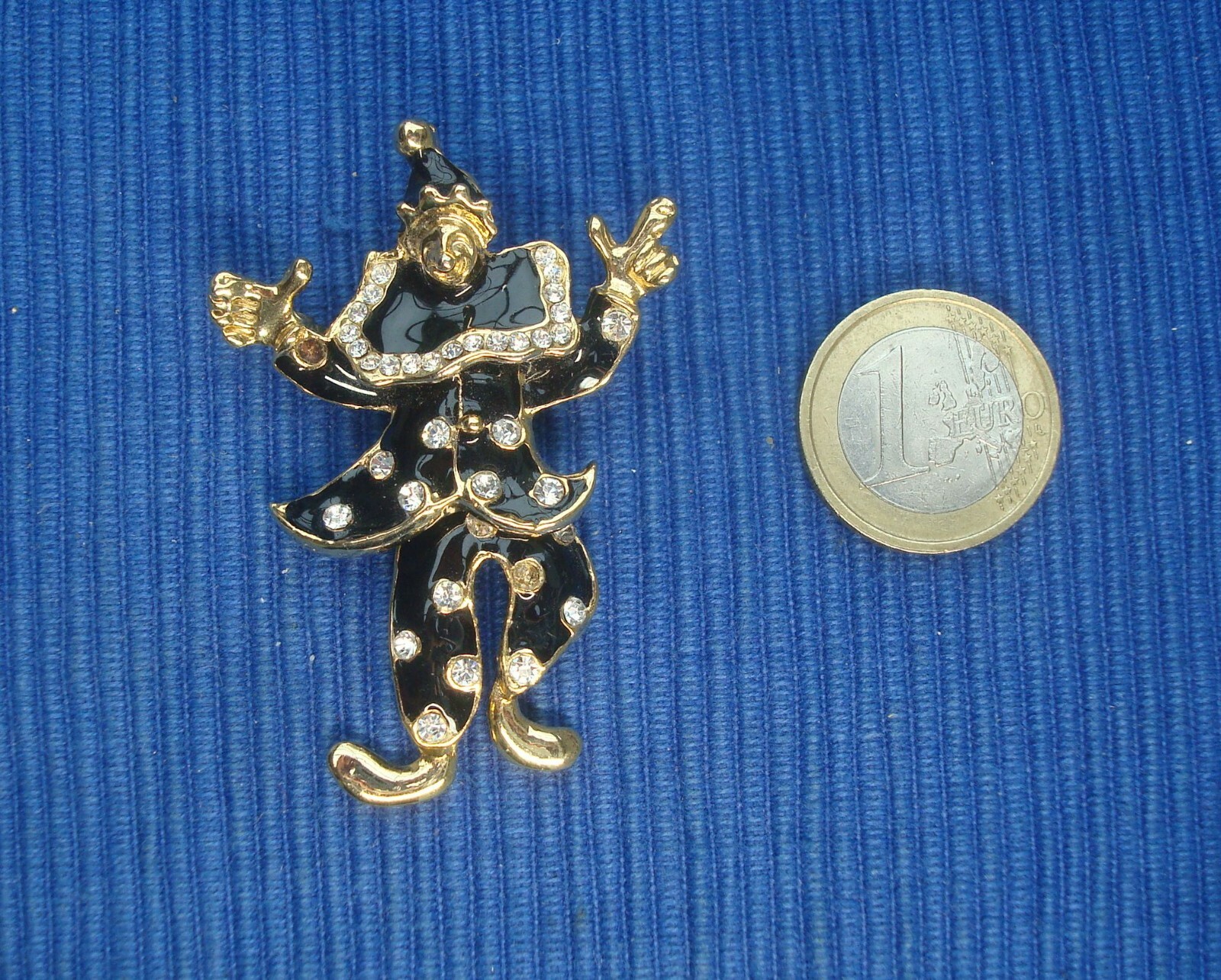 Broche Arlequin articulé en métal doré et émail noir précieux pour robe