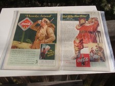 2 VINTAGE COCA COLA ADS ON CARDBOARD AND IN PLASTIC SANTA 1942