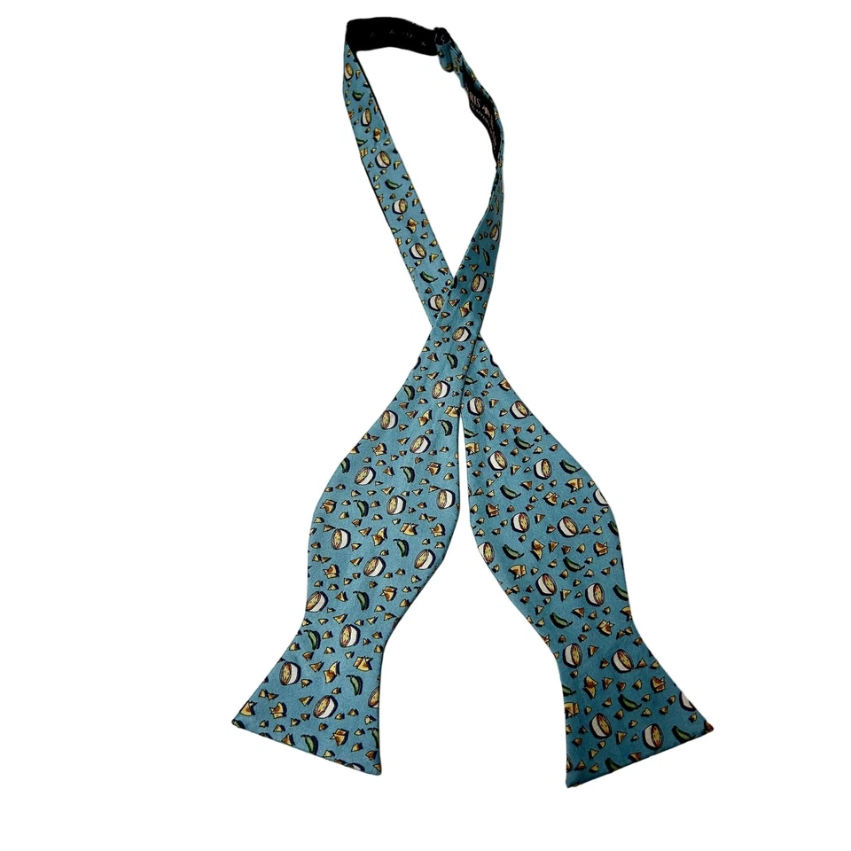 Pajarita de seda azul comida mexicana camarero chips & queso servidor restaurante pajarita Foto 4 de 4