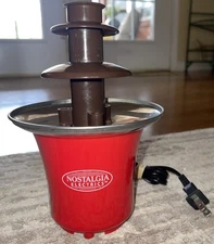 Nostalgia Electrics Chocolate Fondue Fountain Heats And Rotates