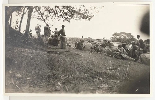 1940s WWII Soldiers Resting On Hillside Military Vintage Snapshot Photo