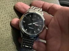 Lige unisex quartz day date watch small band 6 1/2 in. new batt silver black dia