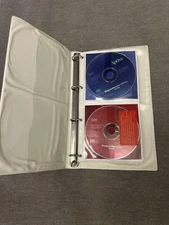 Binder full of Vintage IBM Aptiva Product Recovery & Applications Discs 20 total