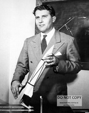 DR. WERNHER VON BRAUN HOLDS A MODEL OF THE V-2 ROCKET - 8X10 NASA PHOTO (EP-049)